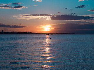 Obraz premium sunset over the river