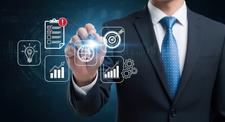 Businessman touches a futuristic digital interface with charts and icons on a dark background.