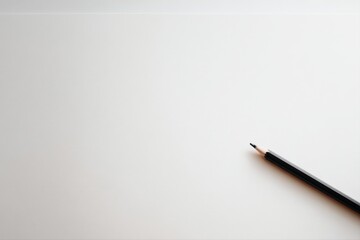 Minimalist Graphite Pencil on White Paper Background for Creative Mockups and Artistic Presentations