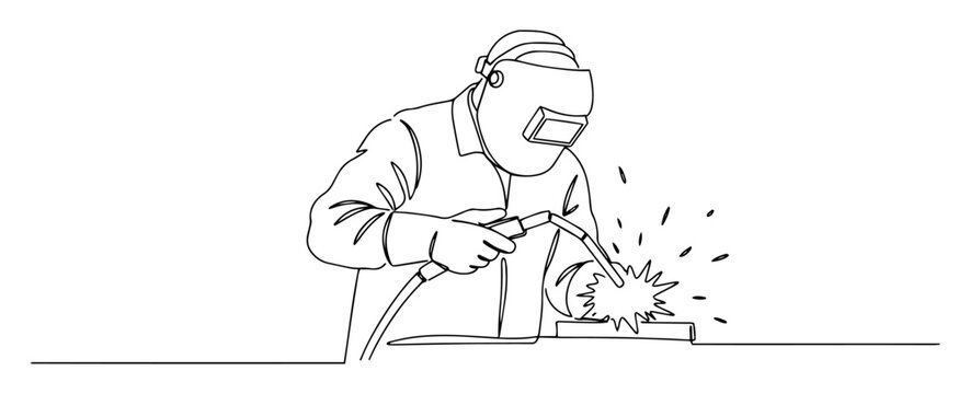 man performing welding work with safety gear