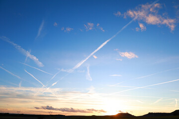Mysterious Contrails Over Sunset Sky, Climate Engineering Theory Concept