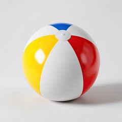 Beach ball with blue, red, yellow, and white panels against plain background