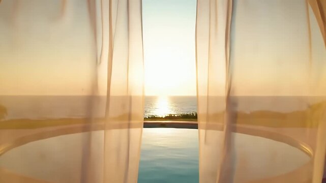 Warmly lit interior doorway frames a tranquil sunset over a quiet beach