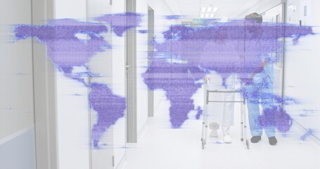 Walking patient in gown using walker in hall, nurse in blue scrubs helping, purple map overlay