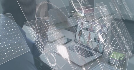 Displaying two laptops showing meeting and tablet on conference table, woman in blazer using AR HUD