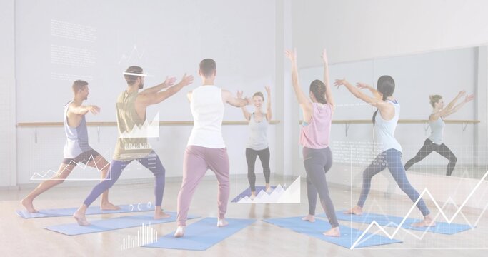 Leading instructor wearing activewear guiding class lunging at studio, blue mats, mirror overlays