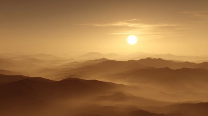 Stunning mountain range at golden hour with bright sun and atmospheric haze creating dramatic natural landscape scenery
