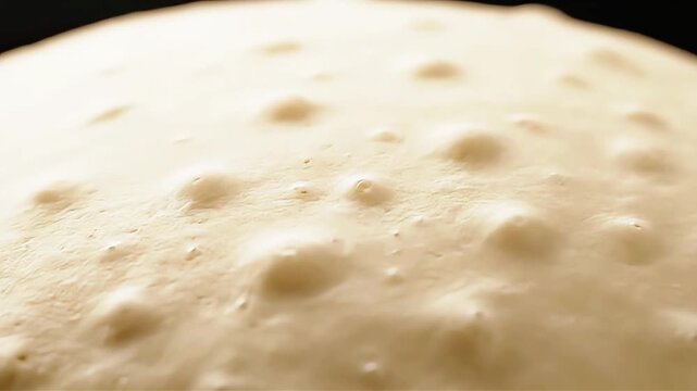 Time-lapse of Yeast Dough Proofing and Bubbling, Showing Fermentation Process