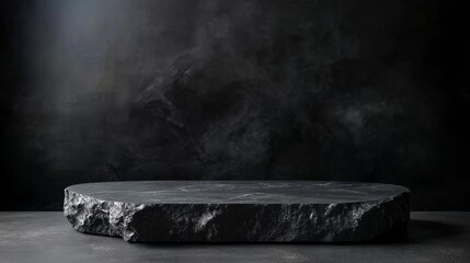 Dark moody background with stone platform ideal for product showcase and display during evening events or promotions