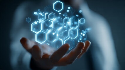 Stunning holographic network of glowing blue hexagons emerges from an open hand, symbolizing digital connectivity and innovation.