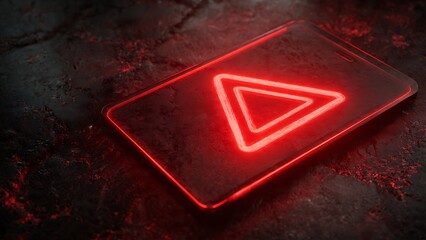 Modern smartphone displaying vibrant neon red play button glowing intensely on dark textured surface, perfect for digital media promotion.