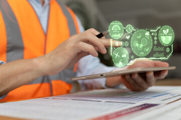 Engineer analyzing zero emission and carbon neutral data on digital interface using tablet. Sustainability technology, ESG concept, green energy, environmental analytics, and modern industrial managem