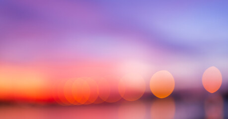 Abstract sunset bokeh background with purple and orange gradient sky,A beautiful abstract...