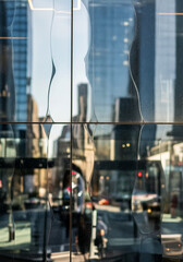 Obraz premium Abstract reflection on glass building, modern urban atmosphere background.