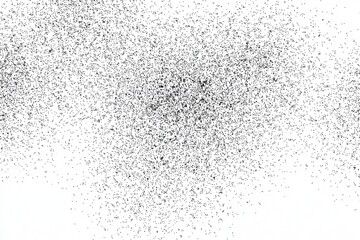 Obraz premium Black dots densely scattered on white, forming a grainy, textured pattern