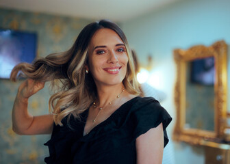 Woman at Hairdresser Proudly Showing Off Her Curls. Self confident lady getting her hair done professionally
