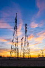 The pylons are in the evening, Substation in the evening, High voltage substation and beautiful sunset glow