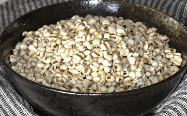 Job's tears in black bowl-Healthy food.