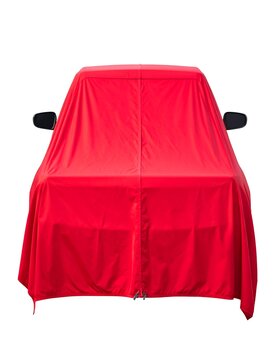 Red cloth covers a vehicle