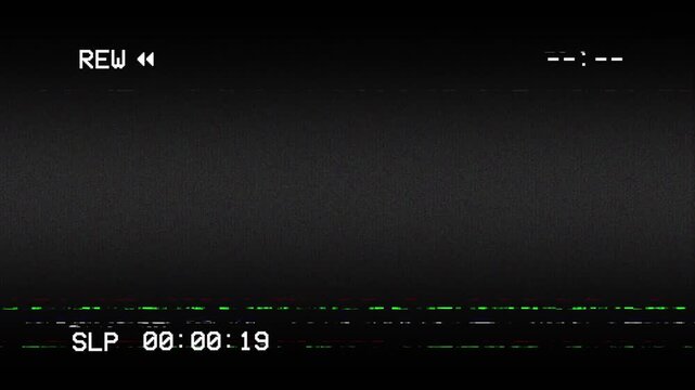 Analog TV VHS REW with static interference glitch effects overlay on black background. 4K Video