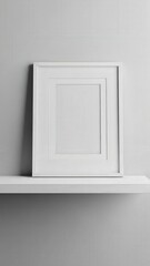 Fototapeta premium White Frame on Shelf Against Wall 1.