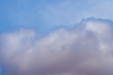 Gathering dark storm clouds in sky