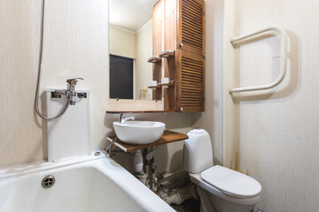 modern bathroom room with toilet and washing machine