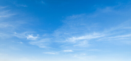 clear blue sky with  clouds