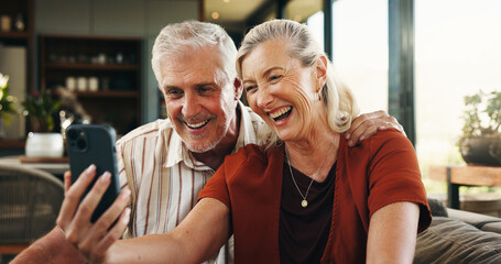 Video call, mature or couple in house with phone, connection or online conversation in living room. Happy, senior man or woman in home with tech, digital communication or bonding with virtual app.