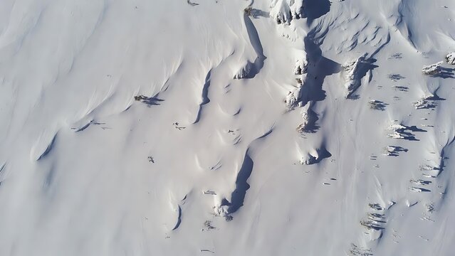 Abstract aerial view of a pristine snowy landscape with deep shadows - Powered by Adobe