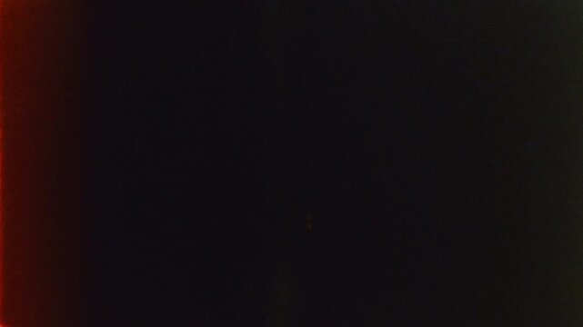 Film Grain Effect with Light Burns filmed with 8mm Camera - 4K  video editing