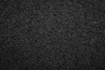 Rough asphalt road surface with concrete texture background.