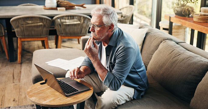Old man, thinking and reading in home with laptop for asset management, retirement fund or prepare will. Senior person, reflection or browse on sofa with computer, pension annuity or estate planning.