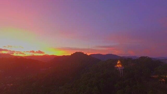 aerial view at Khao Rang viewpoint in twilight.
Khao Rang viewpoint tower is a popular landmark in Phuket town it is on 
Tung Ka hill in central of Phuket town. cityscape background.
