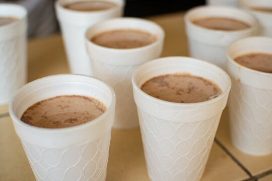 Champurrado in Styrofoam cups for Mexican celebration