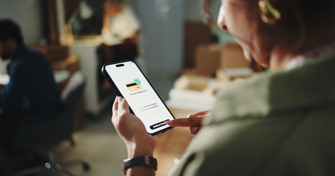 Logistics, startup and hands with phone screen, order and payment approved for supplies or ecommerce. Online, checkout and stock purchase with mobile, dropshipping and person with tech in warehouse