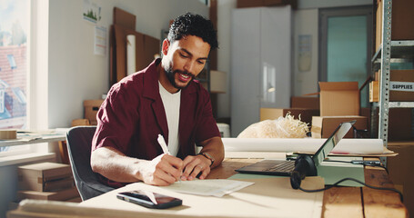 Logistics, smile or man in office with writing, parcel track or inventory management of shipment....