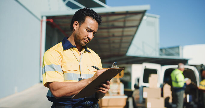 Logistics, clipboard and writing with delivery man outdoor for supply chain, cargo checklist and export. Distribution manager, transport coordinator and quality assurance with person at warehouse
