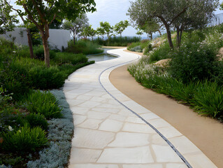 Curving Beige Stone Path Through Green Garden Landscape