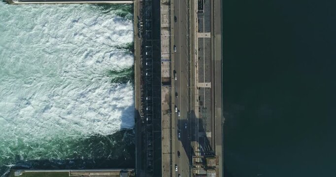 Spillway At Hydroelectric Power Plant. Water Discharge at Hydropower Plant. Dam and Reservoir of Fresh Water. Renewable Energy Source