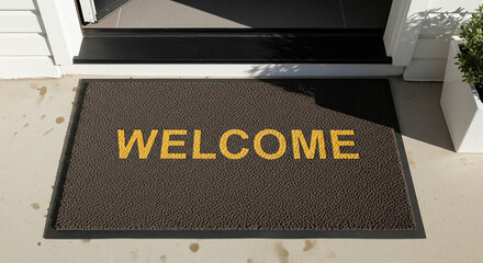 Welcome doormat outside a house entrance, inviting guests to step inside