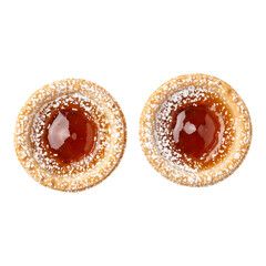 Top view of two sweet jam tart pastries with golden crust and powdered sugar isolated on clean white background