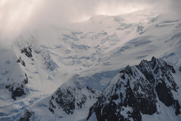 Beautiful Mountain Covered in Snow and Ice in Antarctica. Shetland Islands Volcanic Black Peaks...