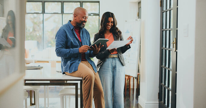 Creative people, documents and tablet in office for internship, project management and designer agency. App, meeting or paperwork with man, woman and mentor in workplace for conversation or update