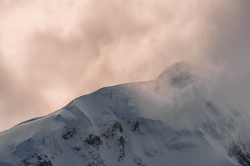 Sunset Mountain with in Snow and Ice in Antarctica. Shetland Islands Volcanic Black Peaks with...