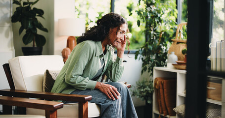 Brain fog, headache and stress with woman in living room of home for burnout, discomfort or pain....