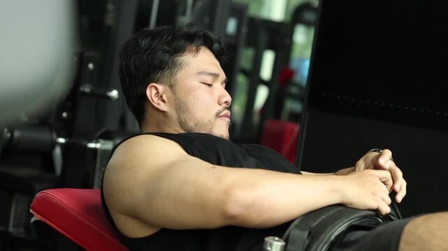 Close-Up of Muscular Man Performing Hip Thrusts on Gym Machine