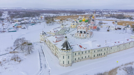 Aerial view of Varnitsky Monastery in Rostov, Yaroslavl Oblast, Russia, shows snow blanketing...