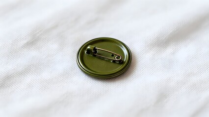 Green Button With Safety Pin