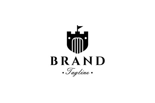 Royal castle logo in shield shape concept with flat vector design style